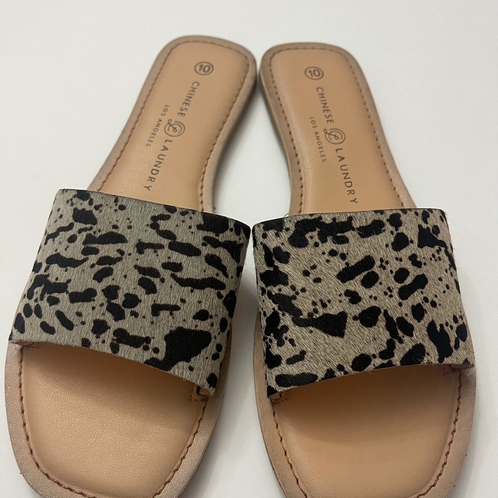 Cow Printed sandals new with no tag size 10